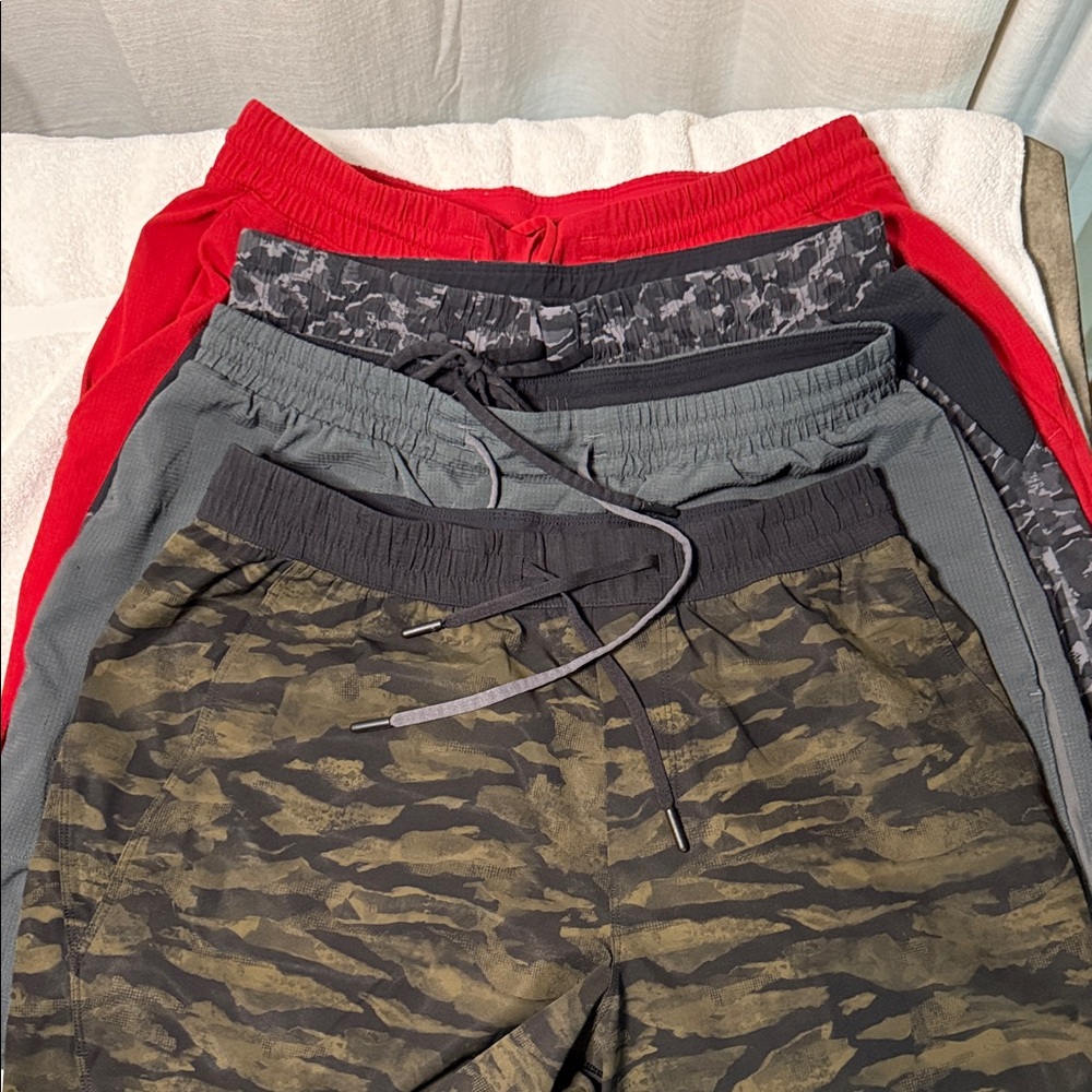 4 Pairs of Lululemon Shorts W/liners. All Large all for 50 $